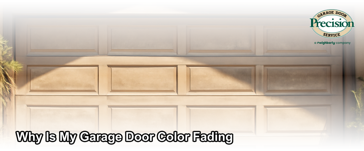 A sun-faded garage door on a residential home in Ventura, California showing visible color loss and chalking on the panel surface